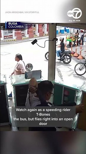 Motorcyclist walks away after crashing into bus in Colombia