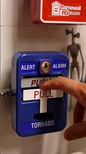 Creepy Siren Head Sounding Alarm Activation