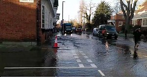 Burst pipe floods Chiswick homes and roads as torrent gushes down street