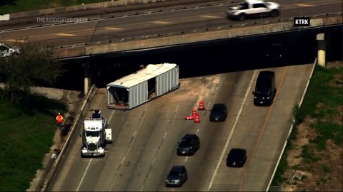 Bridge overpass struck by trucking container in Houston