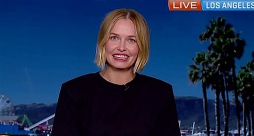 AWKWARD moment Lara Bingle is quizzed on sex life with Sam Worthington
