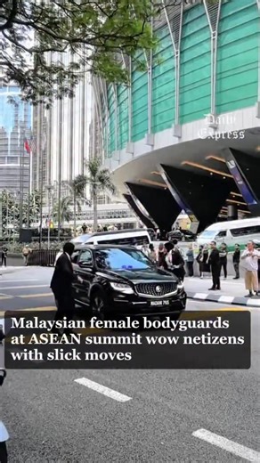 57K views · 801 reactions | This is not a scene from an action movie - two Malaysian female bodyguards were seen leaping onto a moving car while escorting foreign delegates during the 47th ASEAN Summit. Their slick moves have drawn widespread praise online for their skill and composure. Credit: lang131499 | Daily Express Malaysia | Facebook