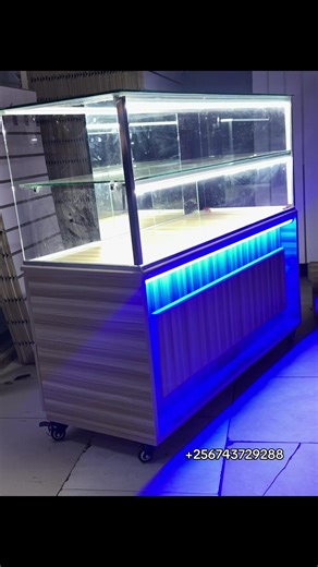 Detailing Display glass counter ideas in Kampla with white display boards and hooks 🪝 sizes ☎️ 256743729288 for sale price in Kampala Uganda/#ugandatiktok #displayboards #glassdisplaycabinets #displaycounter #displaycabinets