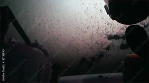 Underwater dive on seabed of Pacific in Cocos Island of Costa Rica. Extreme diving. Swim in world of unique wildlife cave, reefs, coral, sharks, deep sea mountains, canyon.