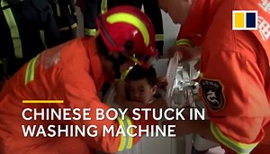 Chinese boy gets stuck in washing machine