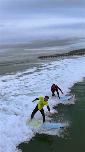 Surf Lesson from PB Surf Shop out catching a wave 01/06/26