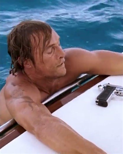 Chained to an anchor, thrown into the ocean. 3 minutes later, he's back. (Fool's Gold)