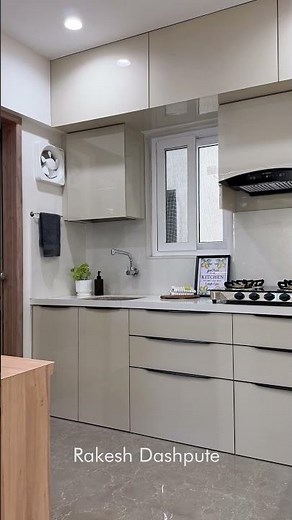 Stylish Open Kitchen Design with Beautiful Cabinets & Breakfast Counter