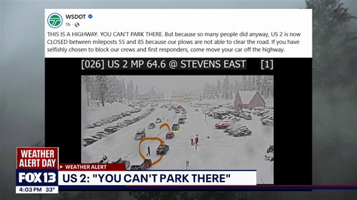 Highway 2 closed by parked cars as snow snarls travel, Sea-Tac flights delayed