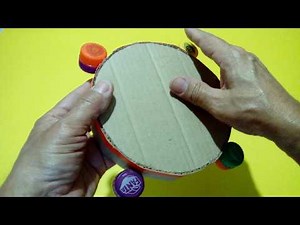 Como fazer um pandeiro muito fácil de papelão e tampinhas com materiais recicláveis e descartáveis