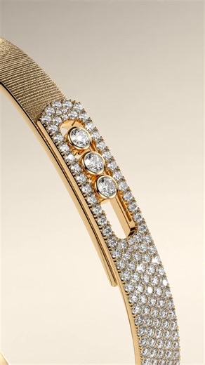 Messika reimagines the iconic Move Noa bangle with a bold new texture. Crafted in chiseled yellow gold and set with diamond, it radiates strength and elegance. Discover Messika in our Fine Jewellery department. #WeirandSons #Messika #MessikaDiamonds #FineJewellery #DublinJewellers | Weir & Sons Jewellers