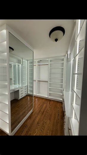 All-White Walk-In Closet Design with LED Lighting