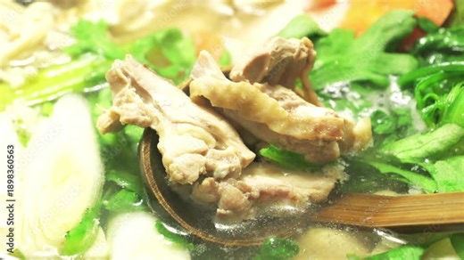 Japanese Hot Pot Cooking in Winter – Steaming Nabemono with Vegetables and Fish Close-Up