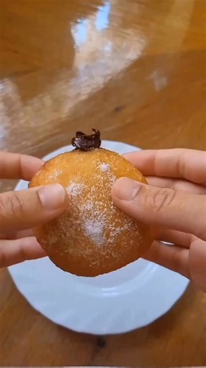 FLUFFY, EGGLESS DOUGHNUTS by @raqia_deen I tried this bombaloni (Italian doughnuts) recipe by @chefyuvrajdewan and was pleasantly surprised how beautifully light and fluffy they turned out - and without using eggs! You have to try this! RECIPE Ingredients: 180ml warm water 7g dry active yeast 40g condensed milk 40g caster sugar 1 tsp vanilla essence 360g bread flour 10g milk powder 1 level tsp baking powder 50g salted butter (whipped separately until pale and fluffy). Method: 1. Add warm water a