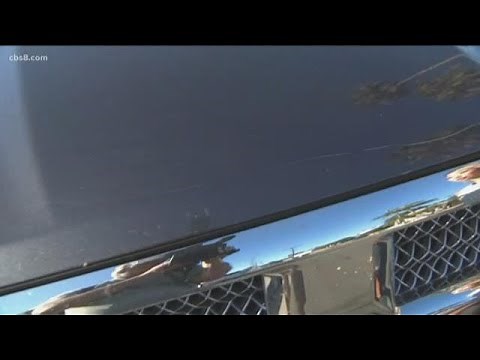Caught on Camera: Woman scratching car with key in Clairemont