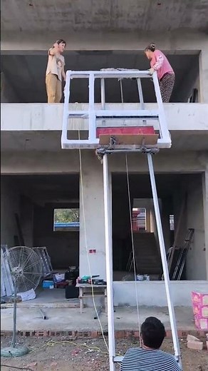 The Process of Using a Hoist to Lift Construction Materials