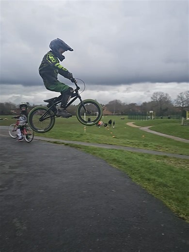 Exciting PumpTrack BMX Action with Big Jumps and Wheelies