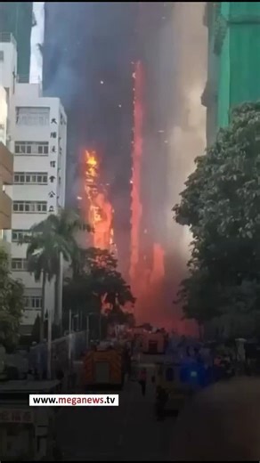 A fire engulfed a residential building in Hong Kong's northern Tai Po district on Wednesday, with plumes of thick grey smoke billowing out as emergency services battled to subdue the blaze. Several people are trapped inside, public broadcaster RTHK reported, citing police, while one man has suffered serious burns, it said. The fire department said it received reports at 2:51 p.m. local time (1851 GMT) that a fire had broken out in Wang Fuk Court in Tai Po. It was upgraded to a No. 4 alarm at 3:3