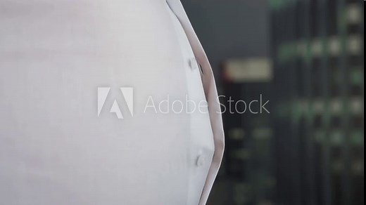 A man's shirt buttons are unbuttoned on his stomach due to a fat belly and obesity. Tight clothes, overweight. Copy space for text. Slow motion
