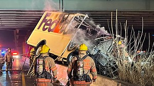 FedEx truck catches fire along I-270, 1 critically injured