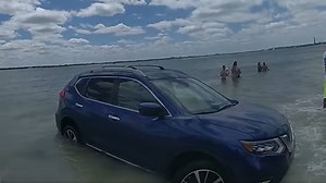 Deputies: Orlando woman drunk driving speeds on beach, crashes car into inlet