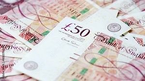 Macro of British £50 - fifty pounds sterling notes. British currency GBP