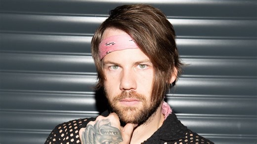 "You’ll find out over the next couple of years what it means when Beartooth headline": Caleb Shomo on idolising David Draiman, duetting with Papa Roach and whether he'd reunite with Attack Attack!