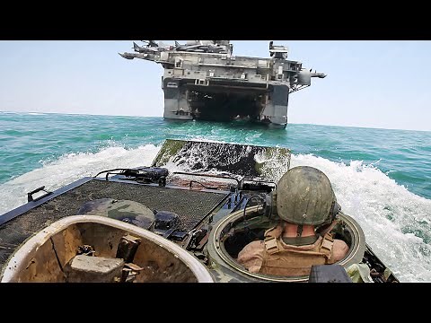 Skilled US Marine Drives Advanced AAV into Massive Warship at Sea