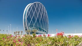 Circular Skyscraper Aldar Headquarters Building Timelapse in Abu Dhabi, UAE. Stock Video - Video of exterior, middle: 120635371