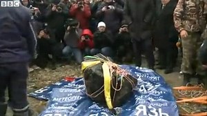 Large 'Meteorite' Dragged Out Of Russian Lake Breaks The Scale At 1,255 Pounds: VIDEO - Towleroad Gay News
