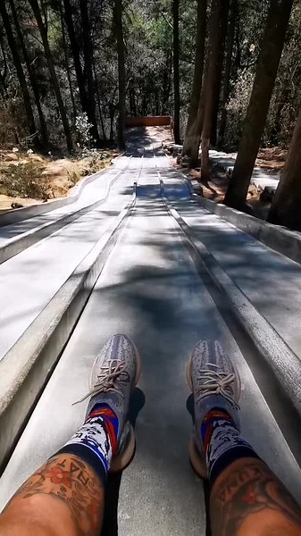 Sliding Down an Outdoor Concrete Slide Experience