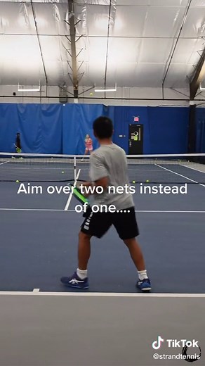 How to be consistent. Aim over two nets for the proper margin. But still excellerate through the ball. #tennis #tips #highschool #foryoupage #strandtennis