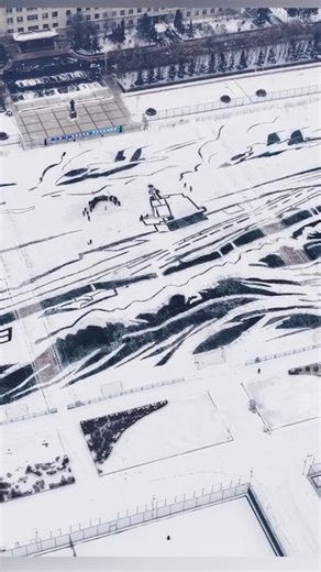 More than 1,200 students and faculty at Harbin Engineering University created a breathtaking scene on a snow-covered sports field. Guided by satellite technology, they "painted" the Fujian aircraft carrier with three fighter jets in formation. #ChinaTravel #BetterLife #Winter #SpringFestival2026 #SpringFestivalGala2026 #YearOfHorse | China Plus Culture