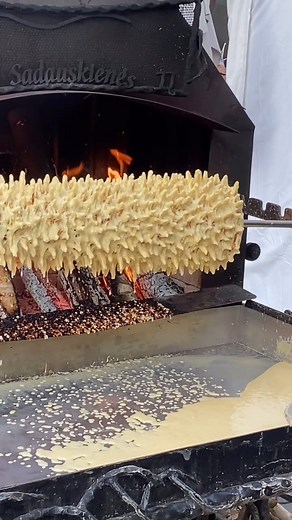 TasteAtlas on Instagram: "Sękacz 📍Poland 🇵🇱 Lithuania 🇱🇹 Belarus 🇧🇾 ⭐️ 4.2 Video: @pielasit_sirdi Known as sękacz in Poland, šakotis in Lithuania, and bankucha in Belarus, this famous tree cake is a vital part of traditional Polish, Lithuanian and Belarusian cuisine. Prepared with a thick batter which is repeatedly poured over a rotating horizontal spit, the cake is often slowly baked in the oven, or more traditionally–over an open fire. During baking, the creamy egg batter slowly drips o