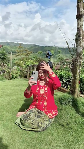 Traditional Elegance: Red Kebaya in the Highlands 🌺️ #Shorts