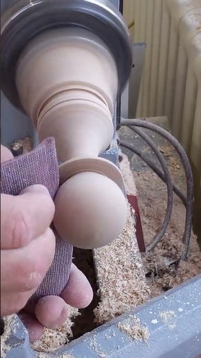turning a chess piece on a lathe