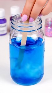 DIY Galaxy Jar Materials: 1 clear glass or plastic jar with lid Cotton balls Acrylic paint or liquid watercolor (purple, blue, pink, black) Fine glitter (silver, iridescent, or holographic) Water Wooden stick or straw Optional: glow-in-the-dark paint or star confetti Create your own mesmerizing galaxy jar that captures the beauty of the cosmos. Using simple materials, this project transforms cotton balls and vibrant colors into a stunning, starry masterpiece. | Homemade Recipes