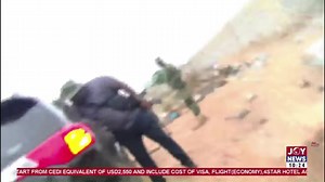 McDan Warehouse demolition: Moment JoyNews Journalist was picked up by armed Mil!tary men, threatening to sl@p him during live coverage. #JoyNews | Joy 99.7 FM