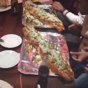 #METERLONGHOTDOG 30 mins to take it down & you could win £30 & our signature TSHIRT worth £25. LOADED WITH: 9 frankfurters, chilli con-carne, jalapeños, cheese AND onions! Tag someone who you think could destroy it!! ONLY AT #MANVSFOODLONDON #THEREALMVF | Man Vs Food London