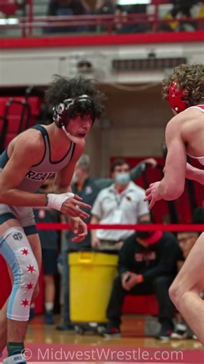 Nick Gomez responds to Liam Ryan's head-tap with a shot and takedown