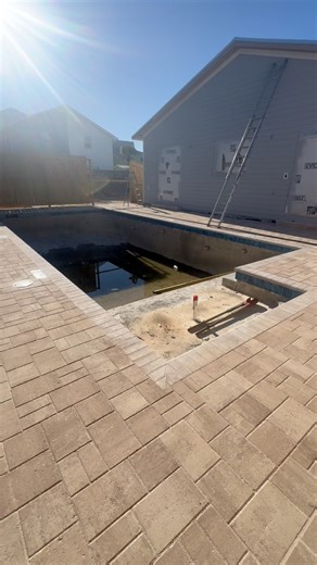 From dirt to destination. 💧🔥 This reel shows the entire journey from the first bucket of dirt to finished decking and coping on a large custom sports pool built for a multi-unit vacation rental property. Designed intentionally for large groups and high use, this pool features: • Shallow play zones for parties and gatherings • Entry steps on both ends for easy flow in and out • Heat & Chill Combo for year-round use • Sunshelf & umbrella holder for ultimate lounging • Color-changing LED lights f