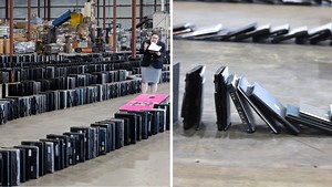 2,910 laptops toppled like dominoes to break world record
