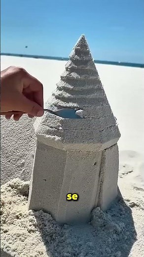 A girl tripped and destroyed her sandcastle 🥺