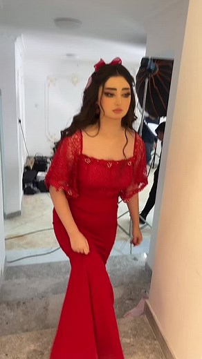 Elegant Red Dress Showcase with Intricate Lace Details