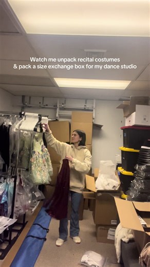 Unpacking Recital Costumes for Dance Studio