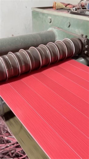 Sanding belt slitting machine.