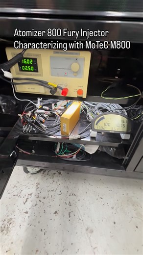 Shane Tecklenburg on Instagram: "Today we are characterizing 18 @atomizerracinginjectors Fury 8800 cc/min injectors at 80/90/100 PSID and 12/14/16/18 volts for one of our racing clients. We are building linearization tables for the @motec_global M150 with our custom firmware package, using our bespoke in house built flow bench which is controlled by a MoTeC ADL1 Dash and M800 engine management system. The software adjustable Peak and Hold setup of the M800 allows us to quickly determine the opti