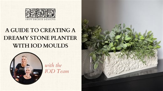 If you’ve ever wandered through a high-end home store, swooning over those elegant, ornate stone planters, but balked at the price tag—good news! You can create that same look at home with the IOD Trimmings 4 Mould, Air Dry Clay, and a few simple steps. Today, we’re reviving an ordinary wooden planter into this darling piece with rich, floral details and a dreamy white stone finish. Whether styled with sprawling greenery or filled with fresh spring blooms pouring over the edges, this planter is 