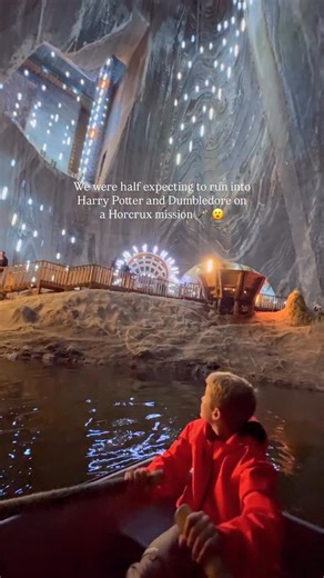 A Horcrux Cave in Romania? 🇷🇴 Hands down one of the strangest places we’ve ever been 🤯 Salina Turda feels like stepping into a movie! Imagine walking through a massive underground salt mine with black walls towering above you, echoes bouncing off every surface and even a salty lake 🧂 🌊 It used to be a working salt mine back in the 1600s. Now it’s an underground amusement park nearly 120m below ground. There’s a Ferris wheel, ping pong tables, putt-putt, pool tables, massage chairs and even