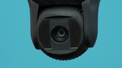 clip-3991505239-surveillance-security-camera-lens-zooms-out-on